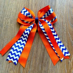Orange and blue ribbon hair tie for girls never worn
